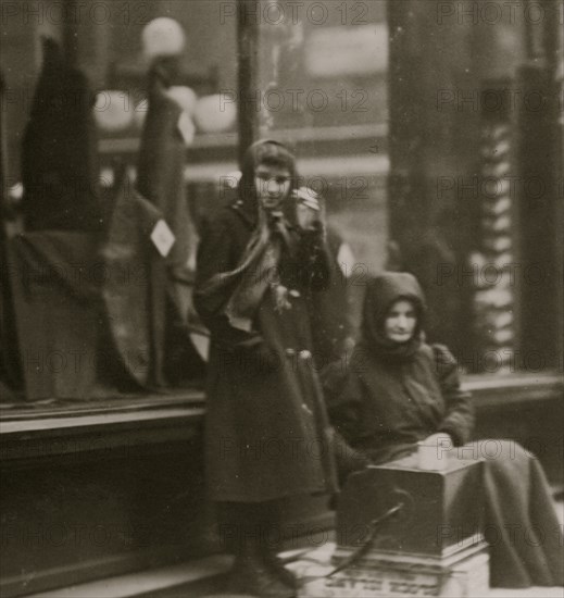 Beggar girl who sings and begs downtown day and night. May 7th, 1910 1910