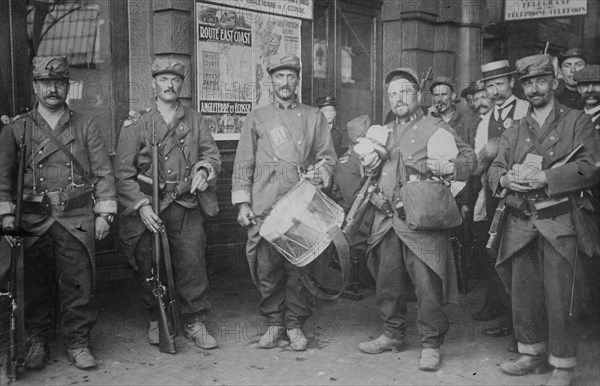 Belgian Drummer and Infantry Troops are shipping out from the TORNAI Railroad Station 1919