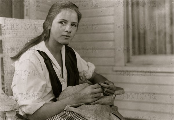 Betsey Price, First year high school at her Club sewing. 4 H Club work, Marlinton, W. Va. Location 1921