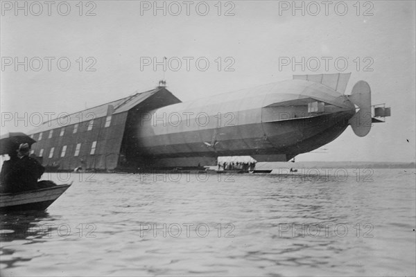 Blimp, Zeppelin No. 3, in shed, seen from water