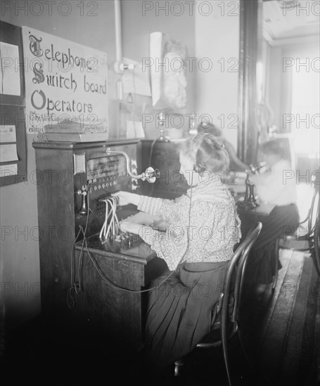 Blind girls operating telephone switchboard