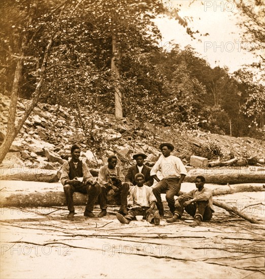 Capt. Ed. Armstrong (Colored) & crew of bateau Tam O'Shanter on beach of New River, 1872