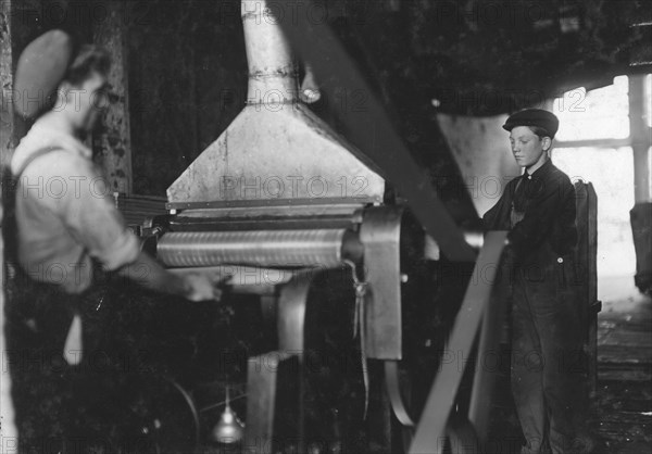 Boy at planing machine, Indiana Mfg. Co. 1908