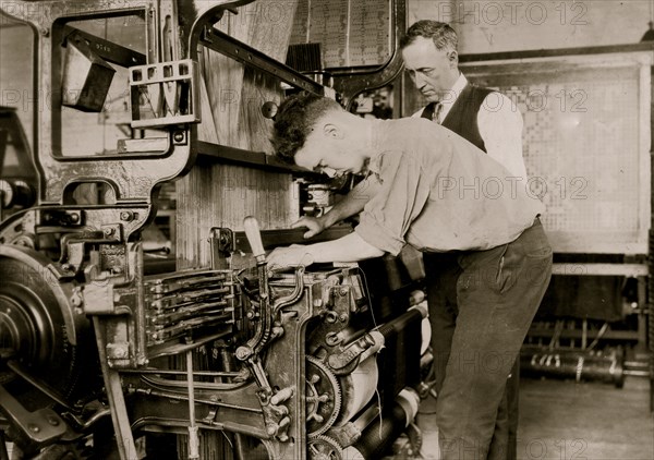 Boy operates a Silk Machine with Supervision 1924