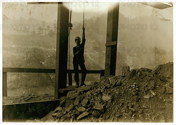 Boy running "trip rope" at tipple.  1908