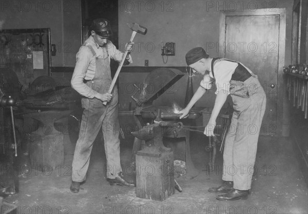 Boys working at forging. Oklahoma City High School 1917