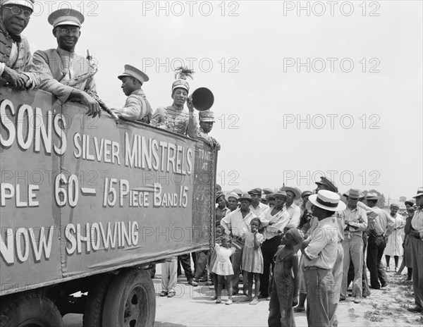 Colored minstrels advertising their show 1942