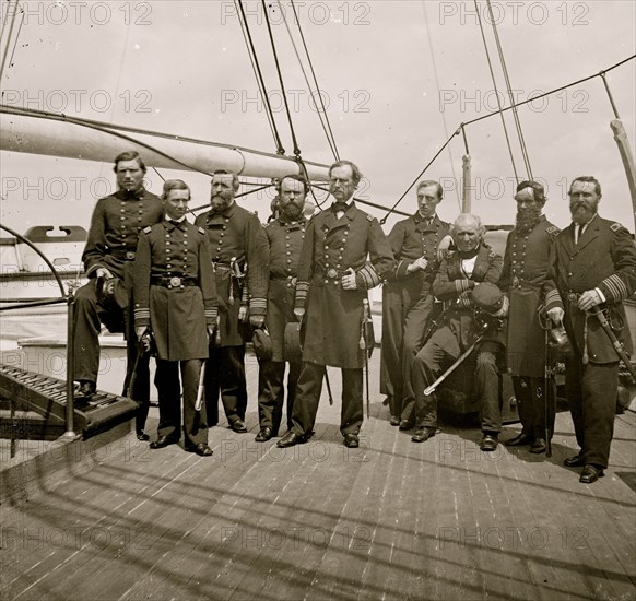 Charleston Harbor, S.C. Rear Admiral John A. Dahlgren (fifth from left) and staff aboard U.S.S. Pawnee 1864