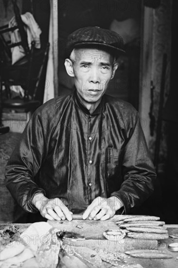 Chinese Cigar Maker in Native Costume 1920