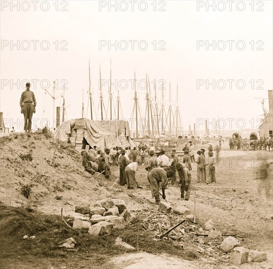 City Point, Virginia. Blackes working along the wharf 1863