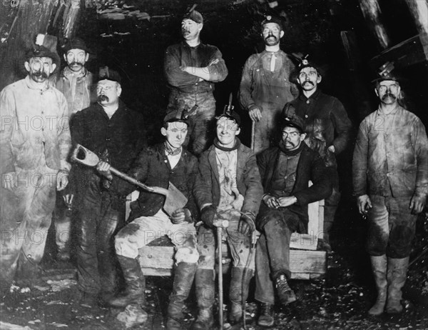 Covered in Coal Dust, The miners pose after a day's work 1912