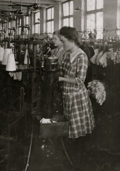 Continuation school girls topping stockings in Ipswich Mills 1917