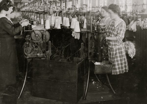 Continuation school girls topping stockings in Ipswich Mills 1917