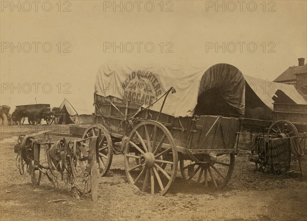 Covered wagon for "Headquarters baggage" and saddlery, probably a Civil War military camp 1863