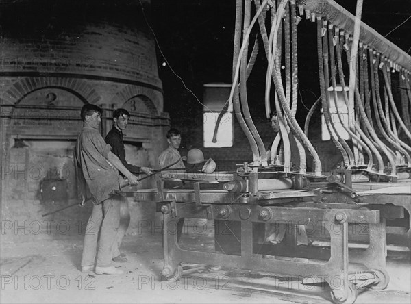 Crescent Glass Works - At the Rolling Machine. 1908