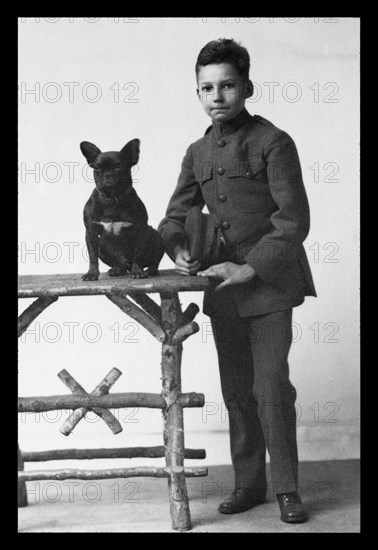 Boy with French Bulldog