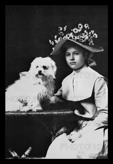 Woman in Bonnet with Maltese Terrier 1900