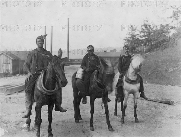 Going home, riding their horses after a day at the mine 1908