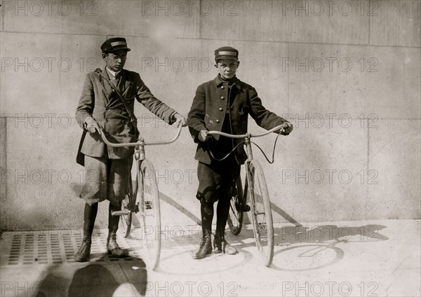 Two Messengers in DC on their bikes. 1912