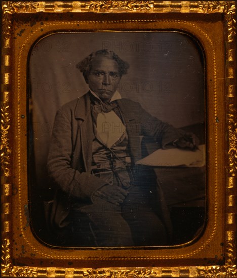 Edward Morris, three-quarter length portrait, full face, seated at desk 1857