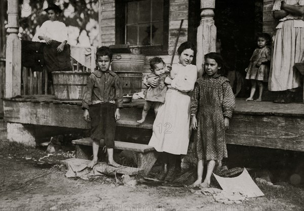 Family -. All except smallest baby work in the Barataria Canning Company.  1911