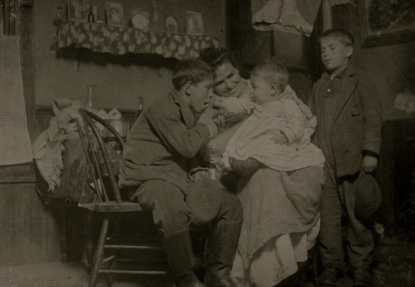 Portuguese immigrants John Sousa, his mother and some brothers and sisters.  1912