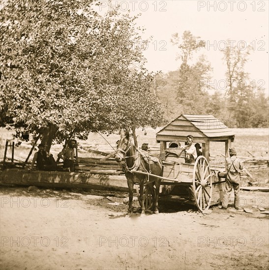 Fredericksburg, Virginia. Soldiers filling water cart. Army of the Potomac 1864