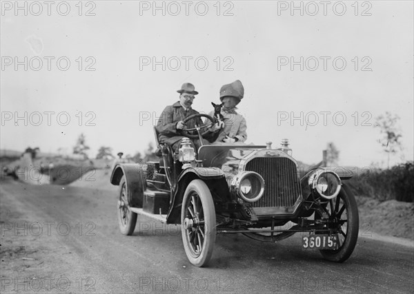 George Bain Wife and dog takes their car for a spin