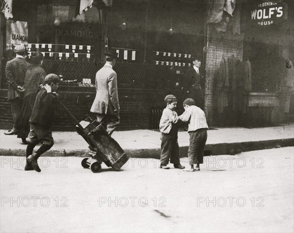 Gimme a smoke. Street boys. 1909