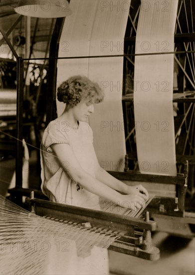 Girl works at Silk Thread machine 1924