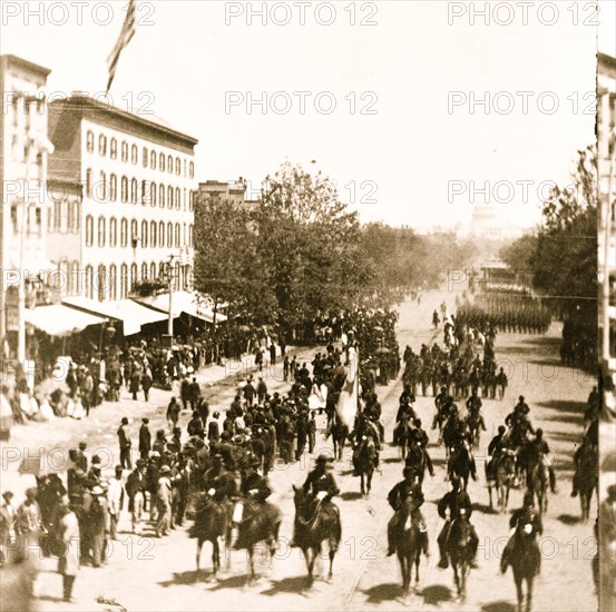 Grand review of the great veteran armies of Grant and Sherman at Washington, on the 23d and 24th May, 1865. Sherman's grand army. Looking up Pennsylvania Ave. from the Treasury Buildings, during the passage of the "Red Star" Division 1865