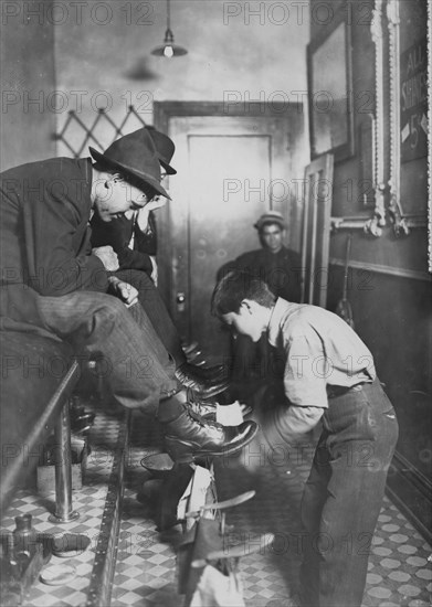 Greel's Shoe-shining Parlor, Indianapolis, Ind. Said he was 15 years old. Works some nights until 11.  1908