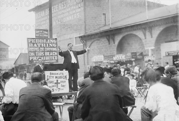 In the midst of Reveling, a Preaches exhorts crowds trying to enjoy Coney Island