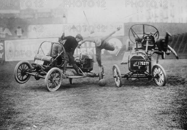 Instead of Horses, Cars carry mallet wielding Competitors in a Game of Polo