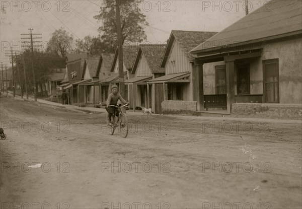 Isaac Boyett, "I'm de whole show." The twelve year old proprietor, manager and messenger of the Club Messenger Service, 1913