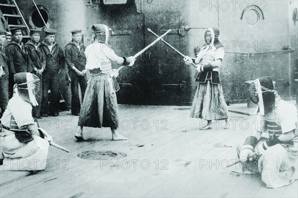 Japanese Sailors Fencing on Board Ship