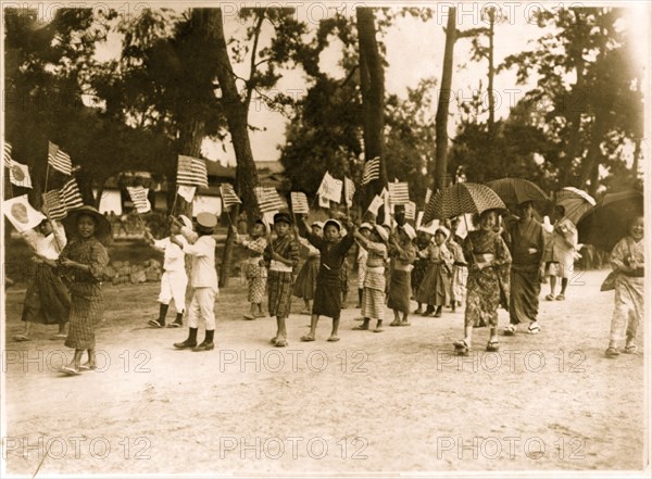 Japanese School Children march and display the American Flag 1905