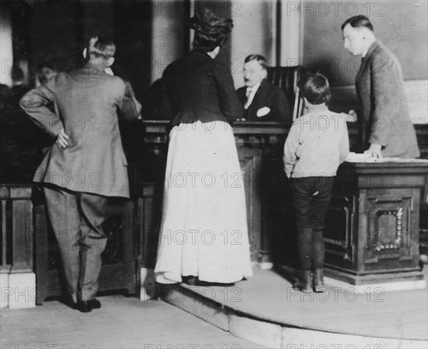 Juvenile Court. An 8 year old boy charged with stealing a bicycle. Thursday May 5, 1910. Location:  1910