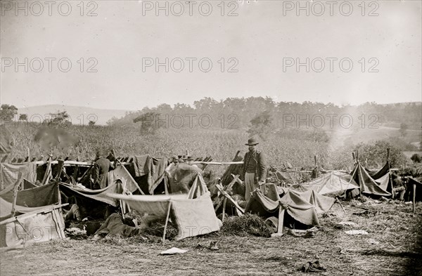 Keedysville, Md., vicinity. Confederate wounded at Smith's Barn, with Dr. Anson Hurd, 14th Indiana Volunteers, in attendance 1862