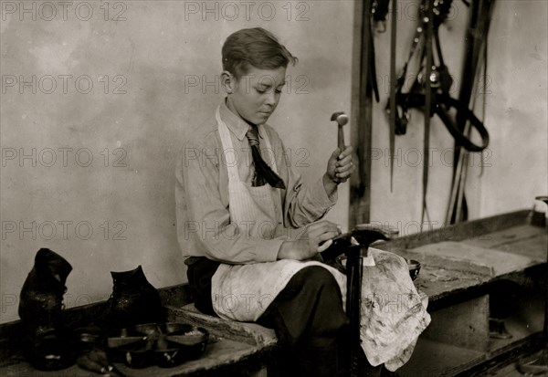 Learning to make shoes. Training School for Deaf Mutes 1917