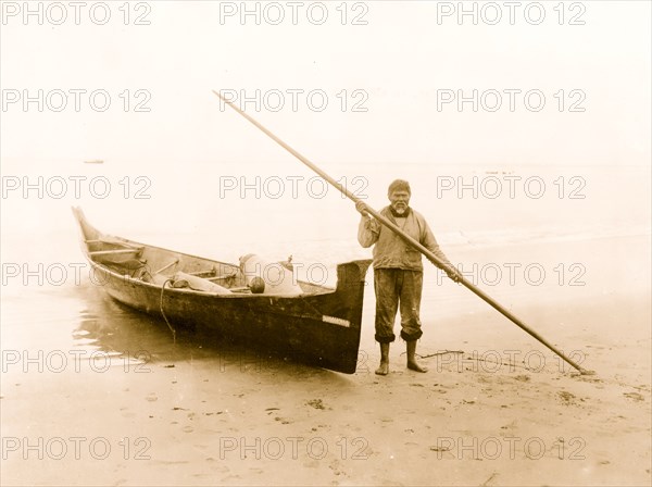Light House Joe, an old Makah Indian by boat,  1911