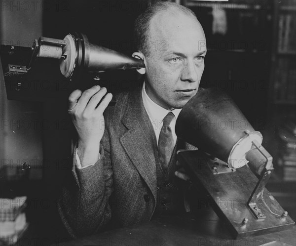 Man Hold's Bell's First Telephone 1920