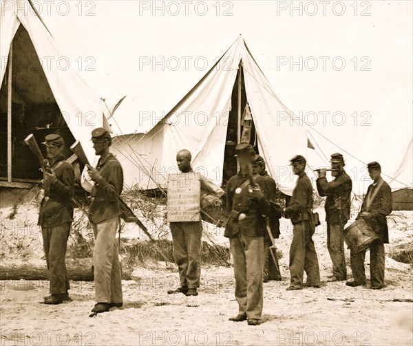 Morris Island, South Carolina. The "rogue's march" drumming a thief out of camp 1863