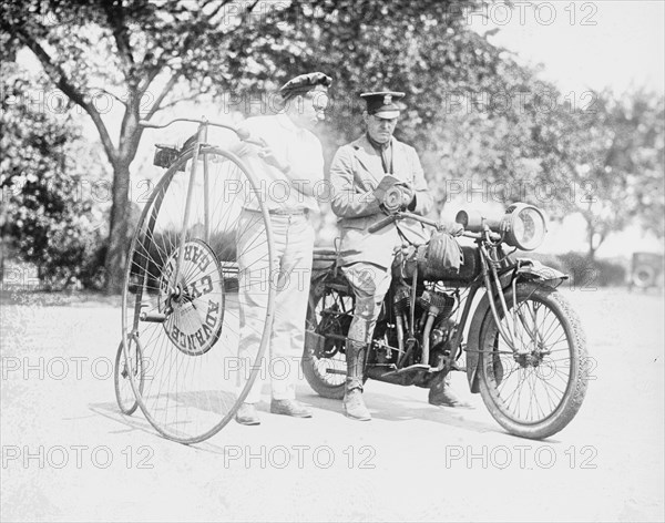 Motorcycle Cop Give a Bicycle Rider a Traffic Ticket for Speeding 1921