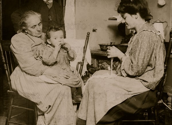 Italian Families manufacture lace from their tenement apartment 1911