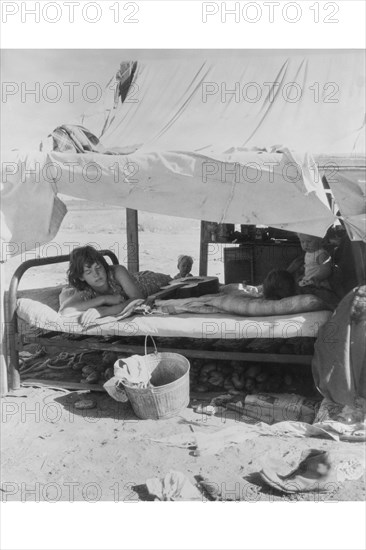 Oklahoma potato picker's family encamped  1935