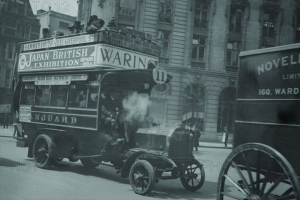 Omnibus on London Thoroughfare carries Advertisements for Japanese British Exhibition