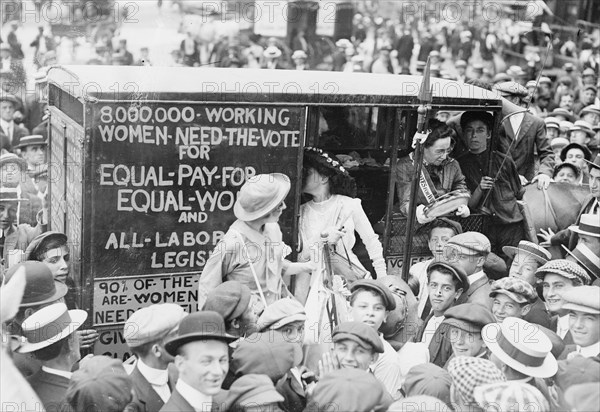 On the Top of a double Decker Bus, Washington Suffragettes make their Cause known