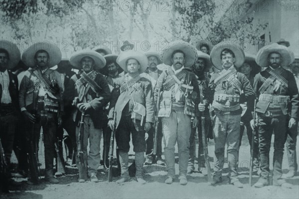 Pancho Villa and His bandits with bandoliers and guns 1919