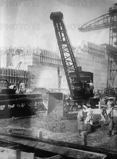 Pedro Miguel locks. Auxiliary crane dumping concrete, Panama Canal 1910